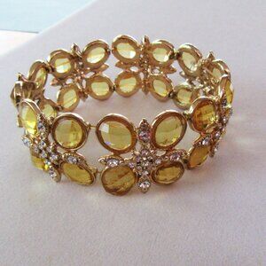 Yellow bevel set rhinestone stretch cuff bracelet  with clear rhinestones